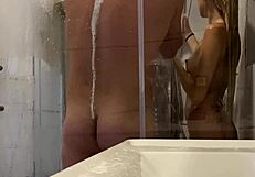 Amateur couple goes hard with rough sex in steamy shower