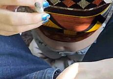 A European girl shows a handjob in public park