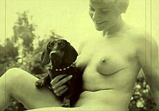 A steamy vintage porn video of a British gentleman with natural tits is presented by Dark lantern entertainment