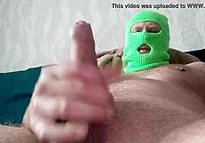 Young naked dude with one large hard cock urinates on floor in High Definition video