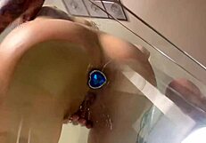 cute girl teases with wet buttplug