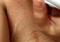 This asian milf enjoys private masturbation at home.