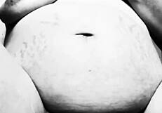 Want to see this horny pregnant milf tease her tits?