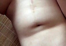 This asian milf enjoys private masturbation at home.