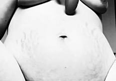 Want to see this horny pregnant milf tease her tits?