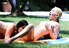 slipping and sliding into her lesbian lover's wet pussy outdoors