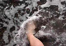 Sea-salted feet and toes of dominatrix nika licked at the beach