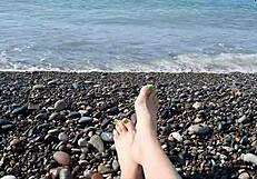 Sea-salted feet and toes of dominatrix nika licked at the beach