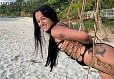 Beautiful Lari in shibari bondage at sunset, exposing her small tits and pussy