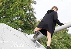 Nude model flashes in public outdoor settings