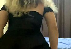 Blonde woman dancing funk in a see-through dress