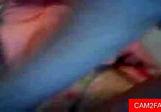 Webcam babe teases shaved pussy with solo play