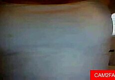 Webcam babe teases shaved pussy with solo play