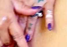 Amateur Solo Inserts Buttplug Into Shaved Wet Pussy In Shower