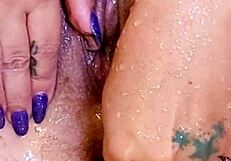 Amateur Solo Inserts Buttplug Into Shaved Wet Pussy In Shower