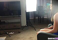 Inside a steamy backstage shoot with Veronica Valentine. Her oiled body shines under lights.