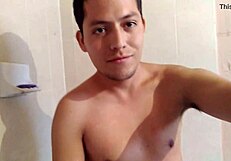 Attractive young gay guy looks handsome