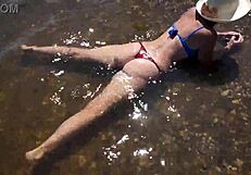 Mature Woman in Bikini at Beach