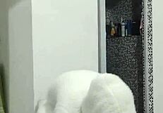 Husband coming out of the shower in towel