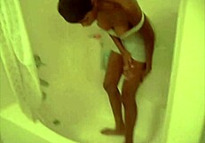 Sweetcandi4u teases her wet panties on webcam, revealing her ebony ass in a ghetto setting with sensual touches