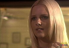 A guy surprises a blonde milf with flowers before pounding her hard.