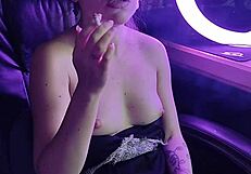 Beautiful asian lady lights up a cigarette in a sexy smoking session