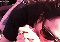 Latina brunette blows on tall bridge.