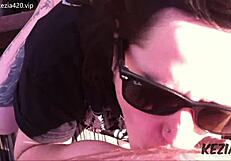 Latina brunette blows on tall bridge.