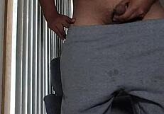 Chalatan masturbates in the living room with sexy cock.