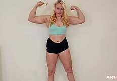 Blonde Bodybuilder Measures Muscles Flexing