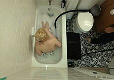 annie archer in the shower with hanging bag