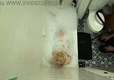 annie archer in the shower with hanging bag