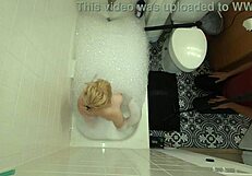 annie archer in the shower with hanging bag