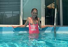 Blonde fucks ass with dildo by pool!