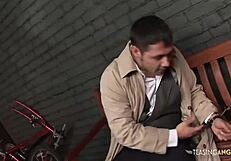 busty brunette cop chatting with a guy on the bench