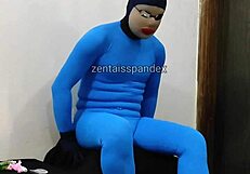 There’s a spandex clad, hooded nurse with a BDSM injection