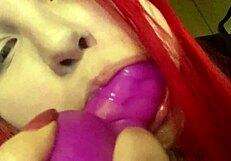 Spit-soaked dragon dildo blowjob