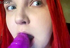 Spit-soaked dragon dildo blowjob