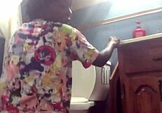 The Ebony Girl Is Dancing, Moving Her Body In Rhythm, Black Skin Shining