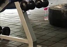 Young woman bends over for doggystyle sex in gym