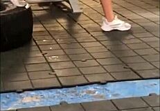 Young woman bends over for doggystyle sex in gym