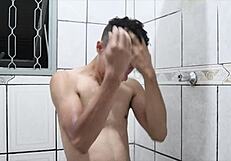 i'm watching this delicious brazilian guy taking a bareback bath.