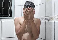 i'm watching this delicious brazilian guy taking a bareback bath.