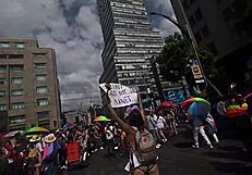 giving kisses in cdmx with miniskirt on lgbt march day