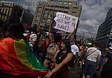 giving kisses in cdmx with miniskirt on lgbt march day