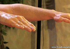 Two men engage in an erotic gay massage on the table