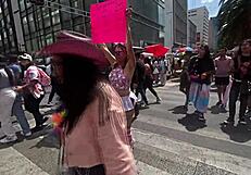 giving kisses in cdmx with miniskirt on lgbt march day