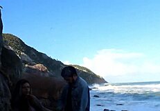 Manuh Cortez seduces stranger on public beach with big tits and crossdressing flair