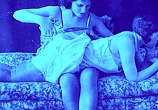 Vintage lingerie model showcases retro stockings and antique pieces