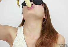 Bold asian women lick erotic bananas in fetish blowjob